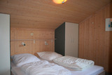Ferienhaus in Pelzerhaken - Am Waldrand Haus A - Schlafzimmer mit Doppelbett