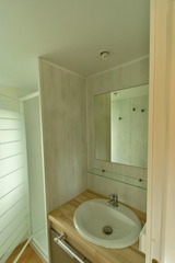 Ferienhaus in Pelzerhaken - Mobilheim M&eacute;diterran&eacute;e im Ferienpark AM WALDRAND - Waschplatz