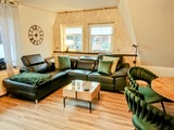 Ferienwohnung in Gr&ouml;mitz - Rosenstrasse 23 - Wohnzimmer Couch mit Relaxfunktion