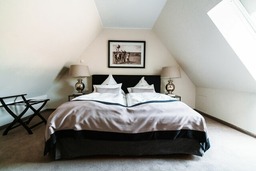 Strandperle mit Balkon